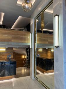 Kuchyň nebo kuchyňský kout v ubytování Nida Hotel Cıty Center