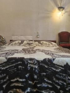Postel nebo postele na pokoji v ubytování Guest House Teo