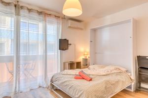 Postel nebo postele na pokoji v ubytování Accès Direct Plage, Vue Mer, Wifi