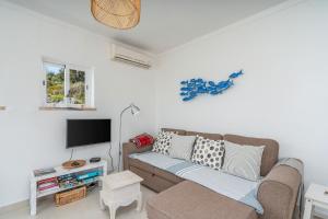 Televiisor ja/või meelelahutuskeskus majutusasutuses Vista Mar - Burgau