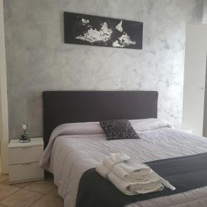 Postel nebo postele na pokoji v ubytování B&B Dimora del centro