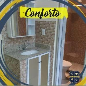 a bathroom with a sink and a mirror at República e hostel da federação vagas compartilhada carnaval carnaval in Salvador