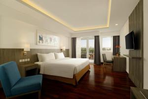 Cama ou camas em um quarto em Aston Canggu Beach Resort
