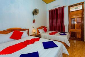 Postel nebo postele na pokoji v ubytování Phong Nha Anh Quốc Homestay