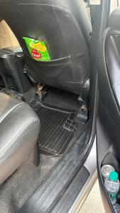 a seat in a car with the trunk open at My car in New Delhi