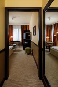 Voodi või voodid majutusasutuse Opera Hotel Zürich toas