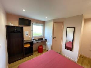 Postel nebo postele na pokoji v ubytování Brit Hotel St-Quentin/Nord