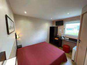 Postel nebo postele na pokoji v ubytování Brit Hotel St-Quentin/Nord