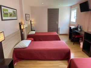 Postel nebo postele na pokoji v ubytování Brit Hotel St-Quentin/Nord