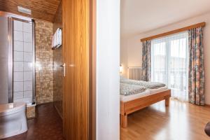 Postel nebo postele na pokoji v ubytování Ferienhaus Alpenrose