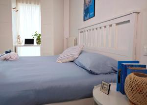 Postel nebo postele na pokoji v ubytování Casa del mare