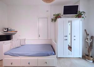Postel nebo postele na pokoji v ubytování Casa del mare