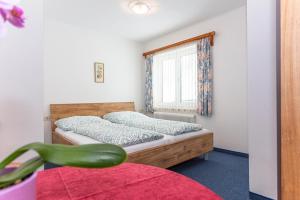 Postel nebo postele na pokoji v ubytování Ferienhaus Alpenrose