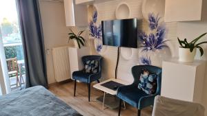 Posedenie v ubytovaní Apartament Wyszyńskiego 10