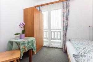 Postel nebo postele na pokoji v ubytování Ferienhaus Alpenrose