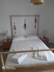 Postel nebo postele na pokoji v ubytování Venetiko Studios