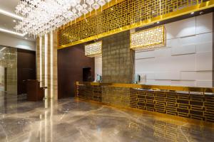 Koupelna v ubytování Pharos Hotels + 30 fotografií