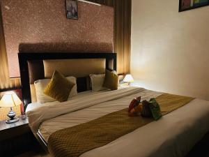 Łóżko lub łóżka w pokoju w obiekcie Hotel Nobo Nest
