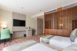 TV o dispositivi per l'intrattenimento presso Hotel Ashwatth