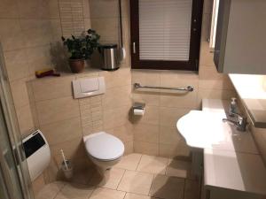 Et badeværelse på Ferienhaus Dünenwald 2