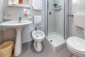 Koupelna v ubytování Hotel Barsotti