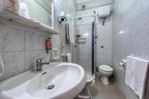 Koupelna v ubytování Hotel Barsotti
