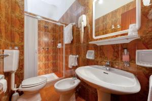 Koupelna v ubytování Hotel Barsotti