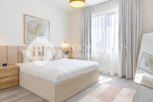 Ένα ή περισσότερα κρεβάτια σε δωμάτιο στο Bloomfields Stylish 2Br Maid Noya Viva