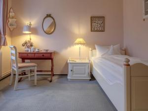Postel nebo postele na pokoji v ubytování Hotel Wiesbaden