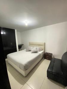 Postel nebo postele na pokoji v ubytování CAS V&B Apartamentos