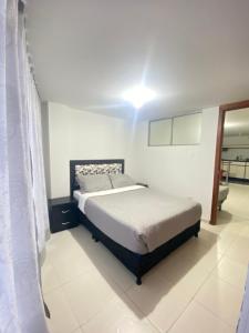 Postel nebo postele na pokoji v ubytování CAS V&B Apartamentos