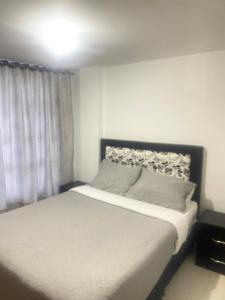 Postel nebo postele na pokoji v ubytování CAS V&B Apartamentos