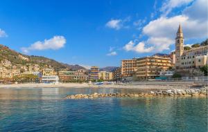 a view of a city with a beach and buildings at Stunning Apartment In Recco With Wifi in Recco +10 photos