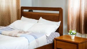 Ένα ή περισσότερα κρεβάτια σε δωμάτιο στο Northern Gateway Hotel and lounge +18 φωτογραφίες