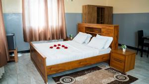 Ένα ή περισσότερα κρεβάτια σε δωμάτιο στο Northern Gateway Hotel and lounge