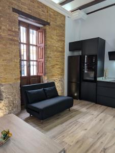 Χώρος καθιστικού στο Las Arenas Suites 3