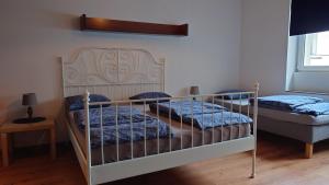 Posteľ alebo postele v izbe v ubytovaní Apartamenty nad Stonehenge