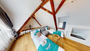 Postel nebo postele na pokoji v ubytování Zentral Altstadt Chur - Bahnhofsnah - Ferienwohnung - Bernina Express - Solution-Grischun