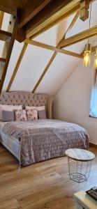 Postel nebo postele na pokoji v ubytování Bátory Luxury Apartman + 36 fotografií