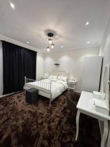 Ένα ή περισσότερα κρεβάτια σε δωμάτιο στο Razz House بيت راز