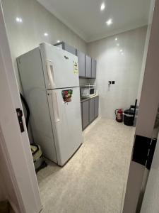 Η κουζίνα ή μικρή κουζίνα στο Razz House بيت راز +8 φωτογραφίες