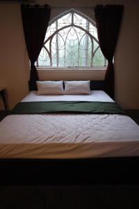 Postel nebo postele na pokoji v ubytování Sea Side Escape Villa