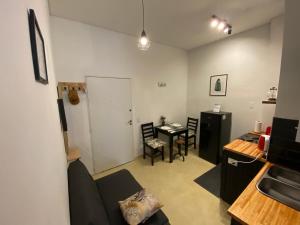 a living room with a couch and a table at Tuc540 in Buenos Aires +7 photos