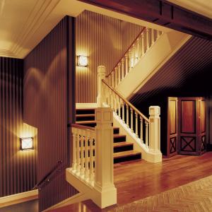 a staircase in a house with purple walls at Hotel 1898 in Barcelona