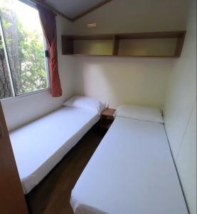 Postel nebo postele na pokoji v ubytování Camping Solcio