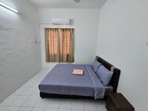 Postel nebo postele na pokoji v ubytování Sunrise Hostel