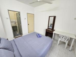 Postel nebo postele na pokoji v ubytování Sunrise Hostel