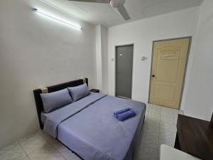 Postel nebo postele na pokoji v ubytování Sunrise Hostel