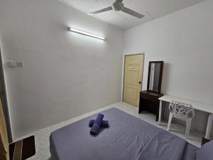 Postel nebo postele na pokoji v ubytování Sunrise Hostel
