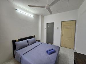 Postel nebo postele na pokoji v ubytování Sunrise Hostel